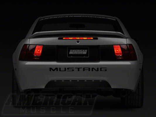 Raxiom Tail Lights and Sequential Tail Light Kit; Black Housing; Smoked Lens (99-04 Mustang, Excluding 99-01 Cobra)