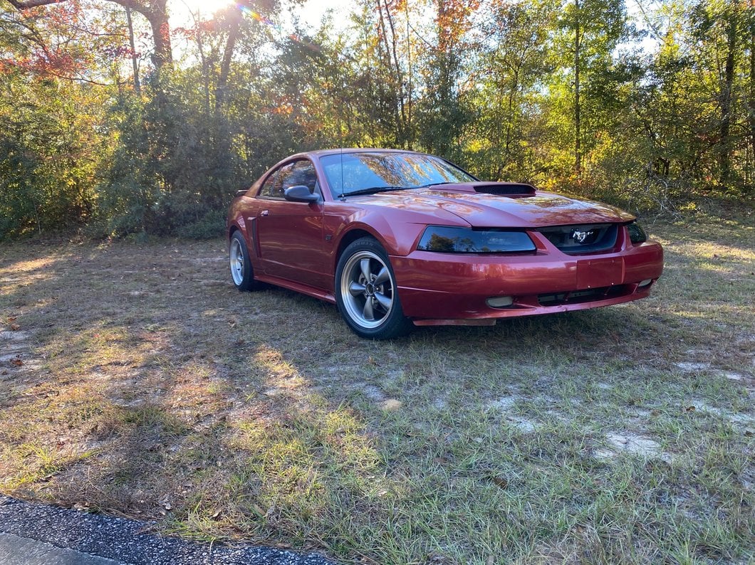 Raxiom Axial Series OEM Style Replacement Headlights; Black Housing; Smoked Lens (99-04 Mustang)