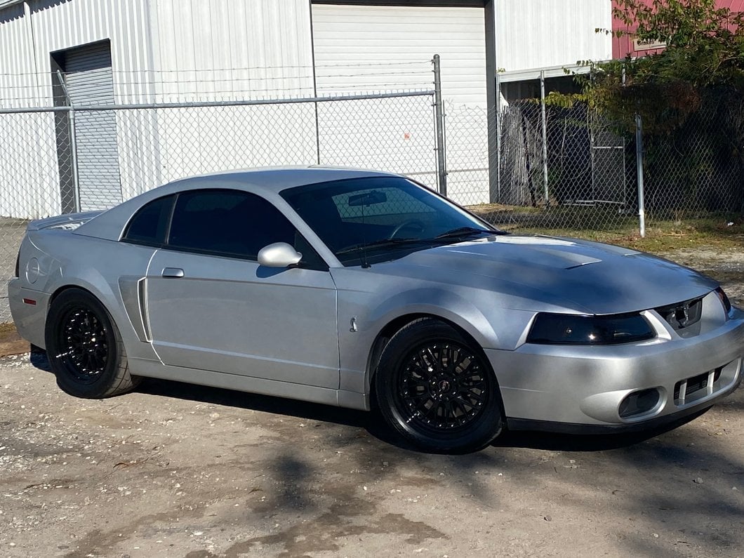 Raxiom Axial Series OEM Style Replacement Headlights; Black Housing; Smoked Lens (99-04 Mustang)