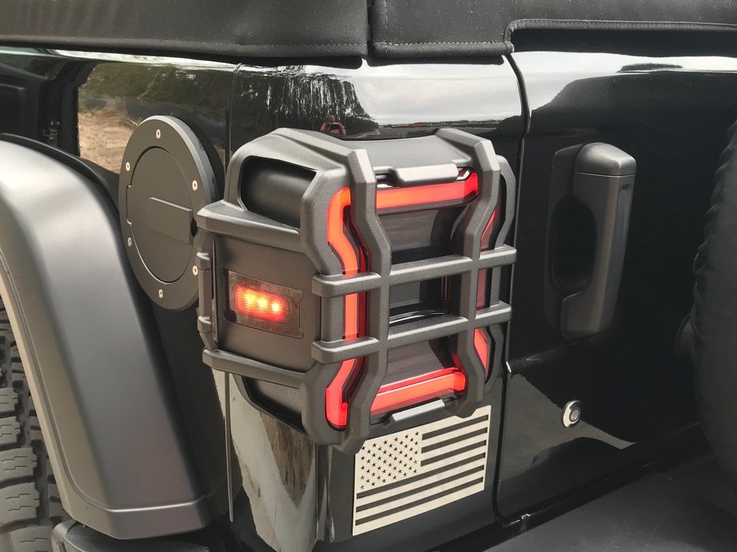 Raxiom LED Tail Lights; Black Housing; Smoked Lens (18-25 Jeep Wrangler JL w/ Factory Halogen Tail Lights & w/o Blind Spot Detection)