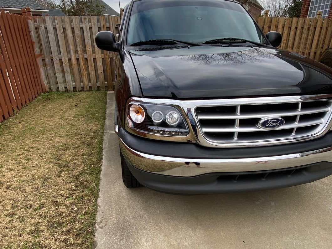 Raxiom LED Halo Projector Headlights; Black Housing; Clear Lens (97-03 F-150)
