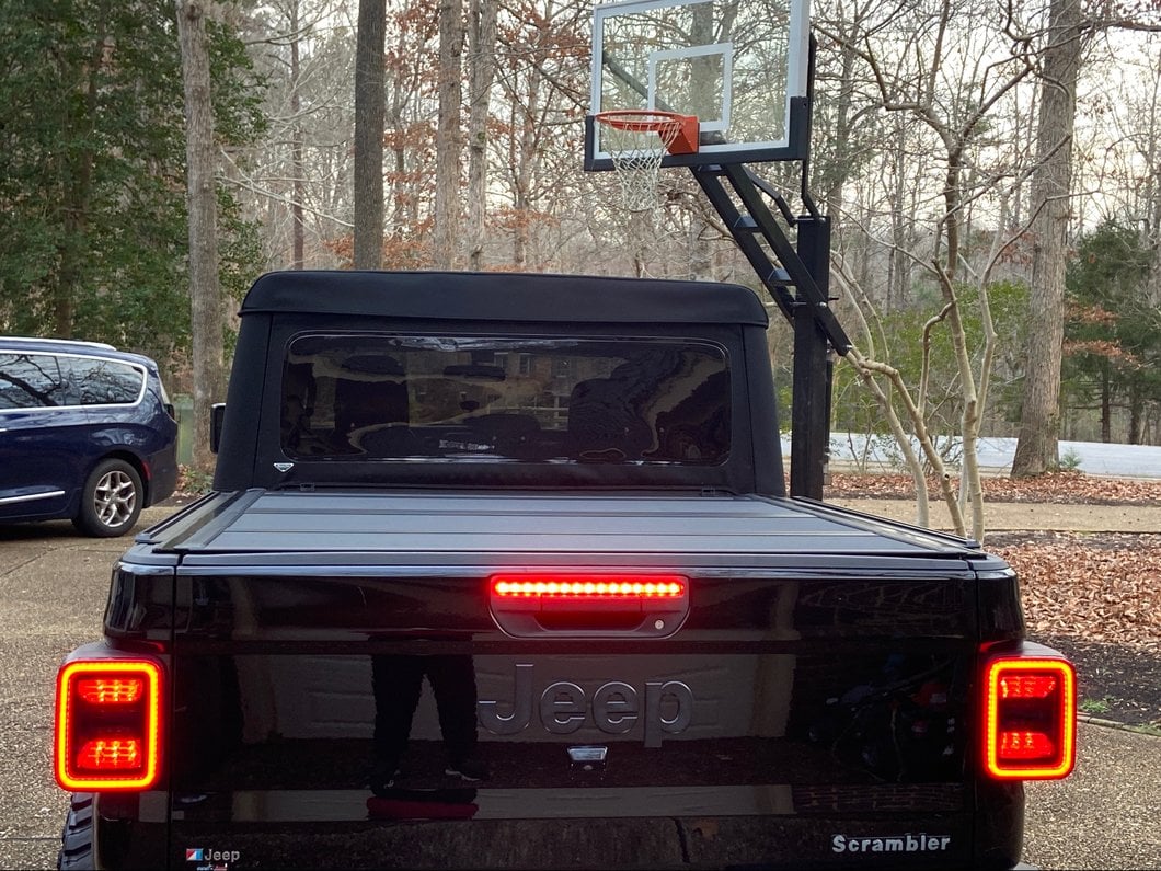 Raxiom LED Tail Lights; Black Housing; Smoked Lens (20-25 Jeep Gladiator JT w/ Factory Halogen Tail Lights & w/o Blind Spot Detection))