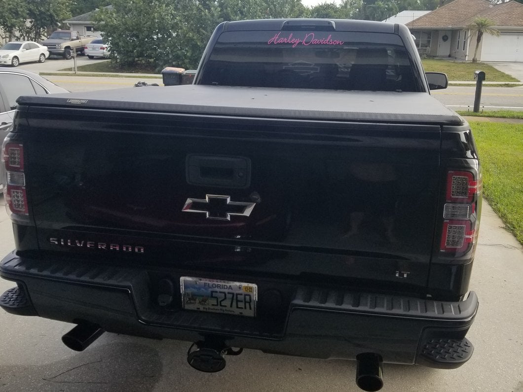 Raxiom LED Tail Lights with Sequential Turn Signals; Black Housing; Clear Lens (14-18 Silverado 1500 w/ Factory Halogen Tail Lights)
