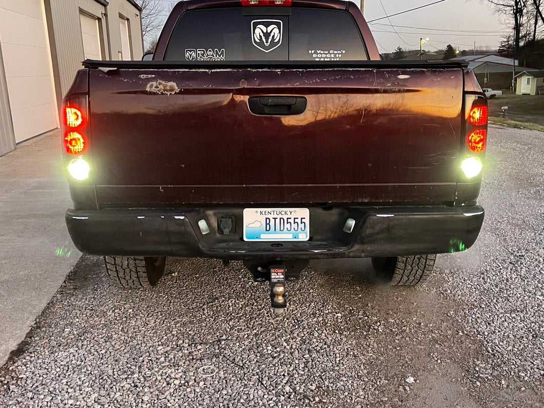 Raxiom Axial Series Tail Lights; Black Housing; Dark Smoked Lens (02-05 RAM 1500)