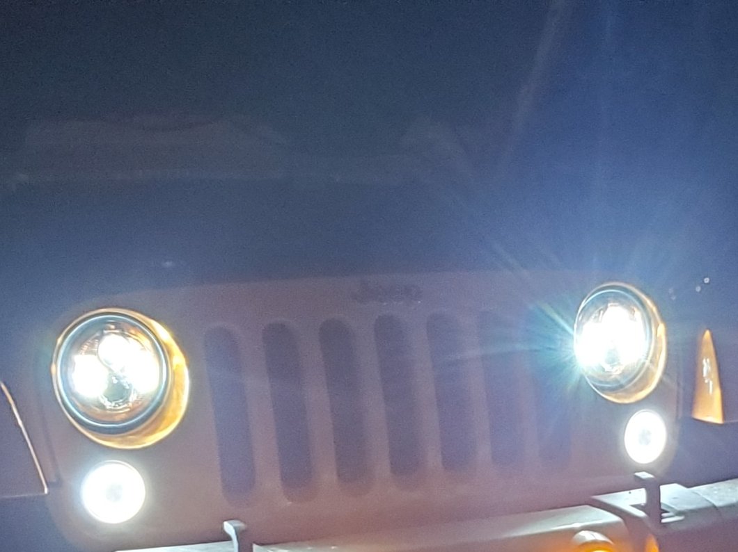 Raxiom 7-Inch LED Headlights; Orange Housing; Clear Lens (07-18 Jeep Wrangler JK)
