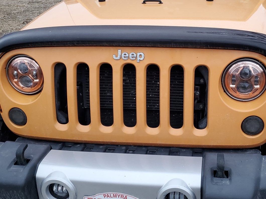 Raxiom 7-Inch LED Headlights; Orange Housing; Clear Lens (07-18 Jeep Wrangler JK)