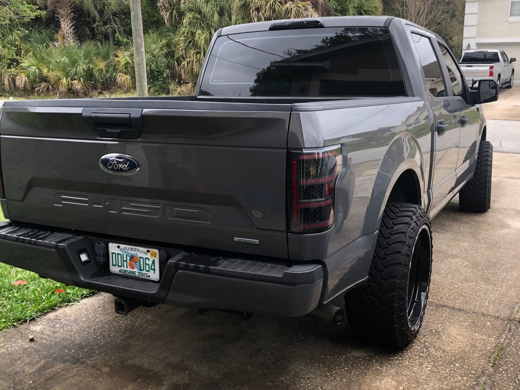 Raxiom Axial Series LED Tail Lights with Sequential Turn Signals; Black Housing; Clear Lens (18-20 F-150 w/ Factory Halogen Non-BLIS Tail Lights)