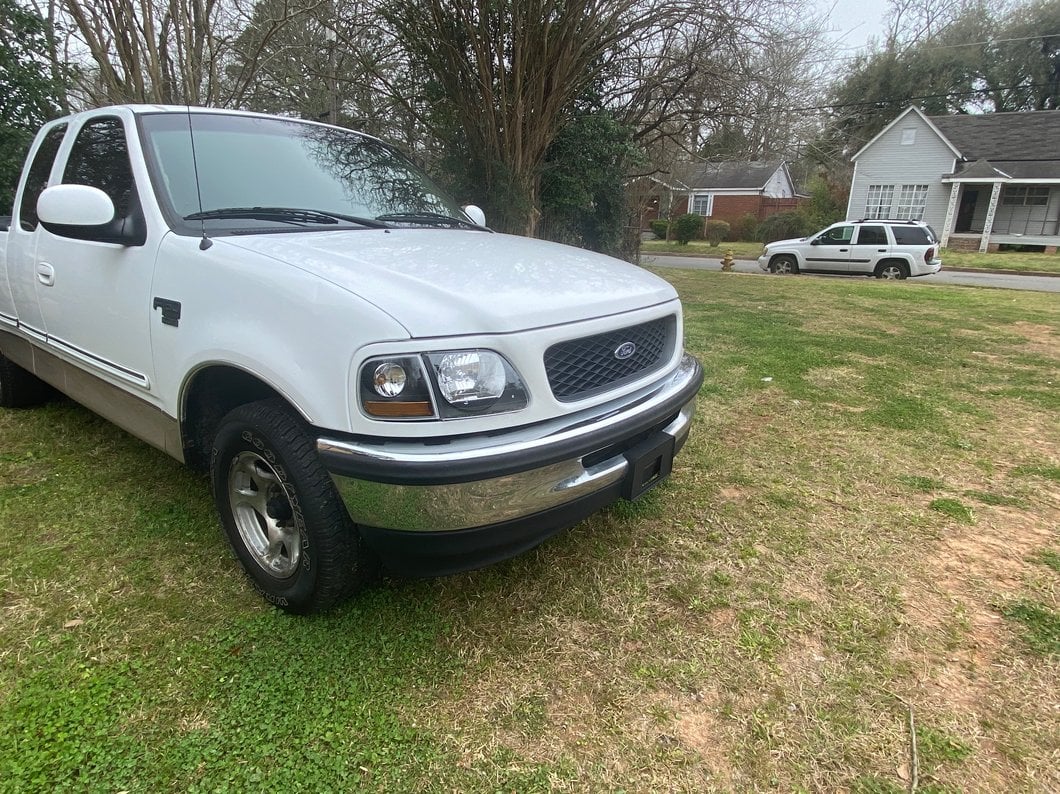 Raxiom G2 Euro Headlights with Parking Lights; Black Housing; Clear Lens (97-03 F-150)