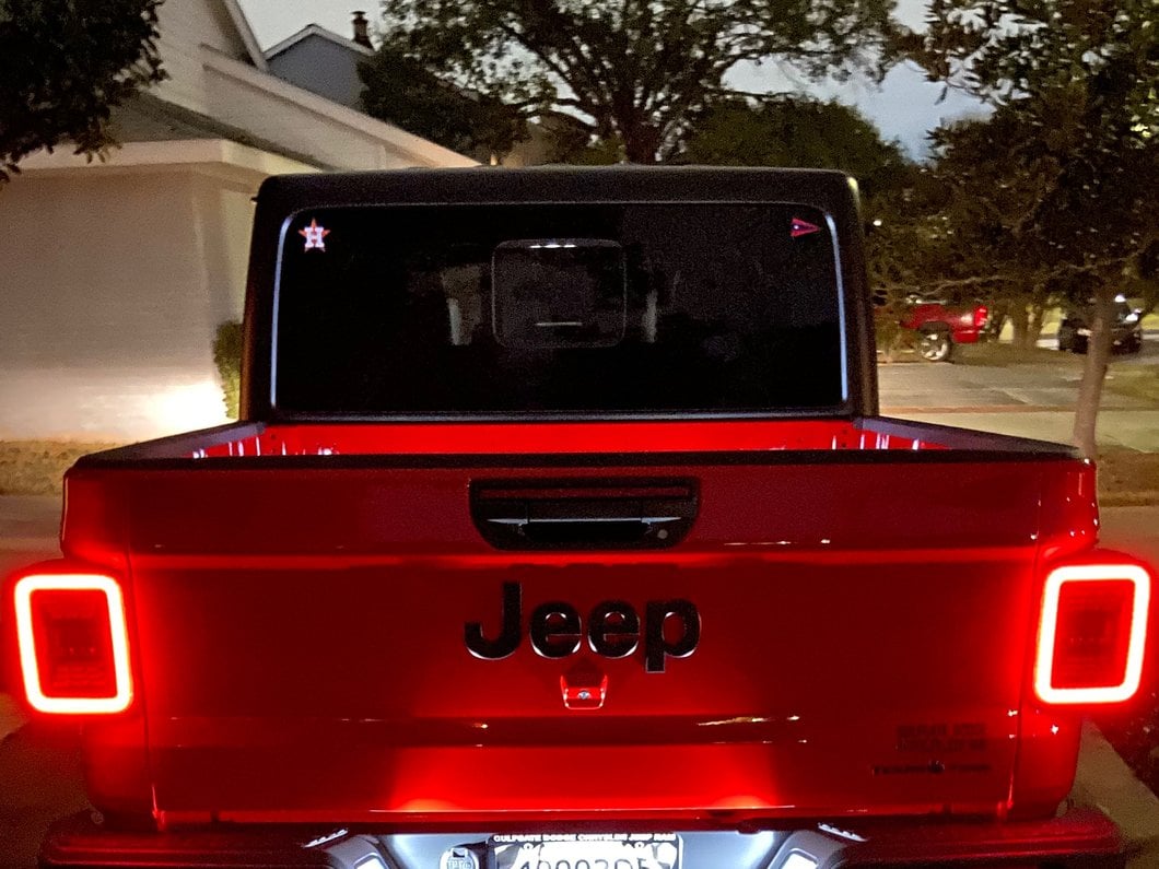 Raxiom LED Tail Lights; Black Housing; Smoked Lens (20-25 Jeep Gladiator JT w/ Factory Halogen Tail Lights & w/o Blind Spot Detection))