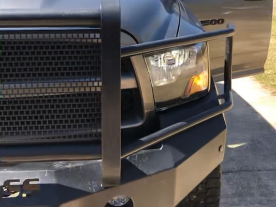Raxiom Axial Series Euro Style Headlights with Single Bulb; Black Housing; Clear Lens (09-18 RAM 1500 w/ Factory Halogen Non-Projector Headlights)