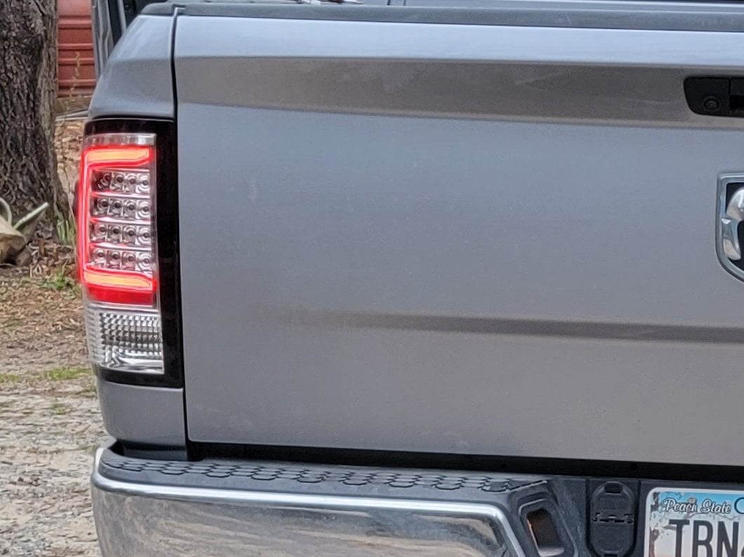 Raxiom Axial Series LED Tail Lights; Chrome Housing; Clear Lens (09-18 RAM 1500 w/ Factory Halogen Tail Lights)