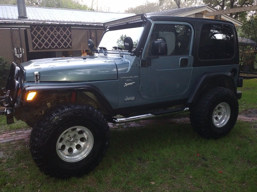 Raxiom 50-Inch LED Light Bar Windshield Mount with Auxilliary Bracket (97-06 Jeep Wrangler TJ)
