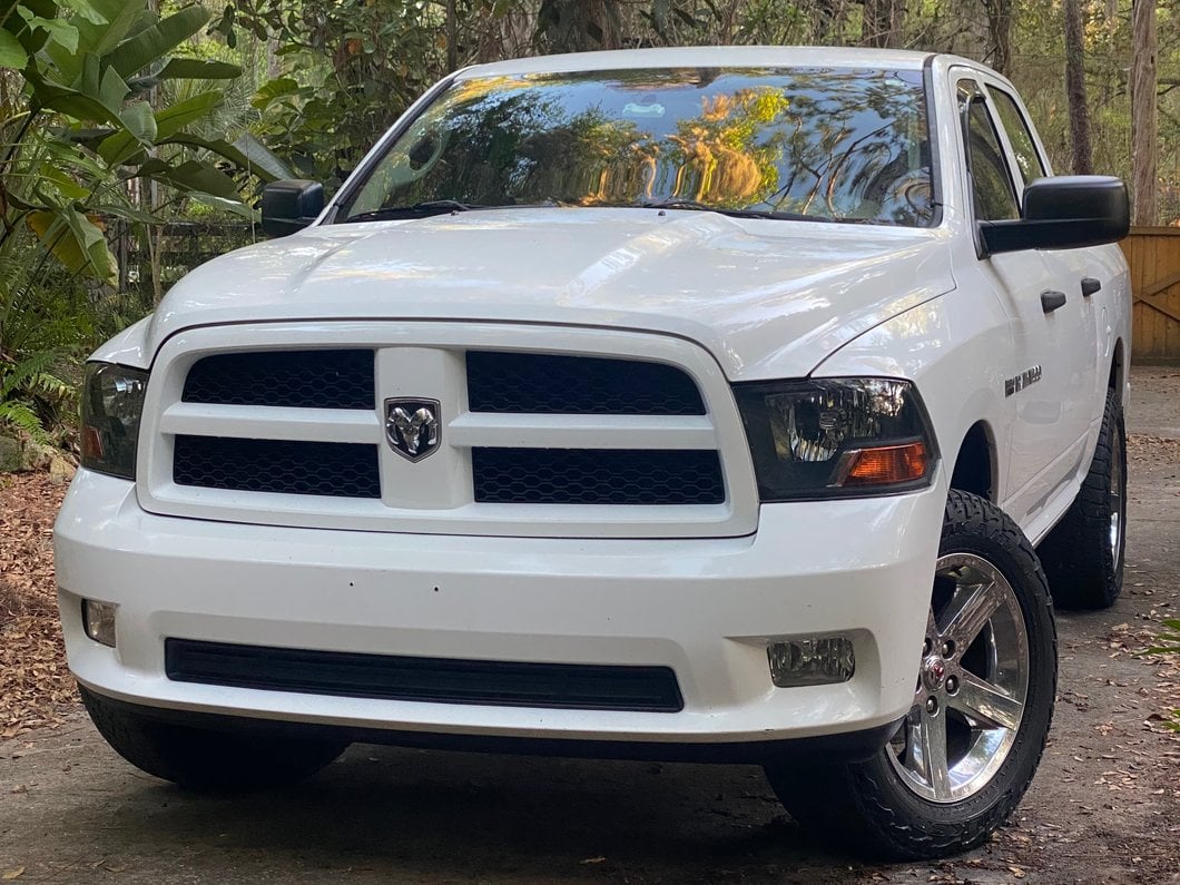Raxiom Axial Series Euro Style Headlights with Single Bulb; Black Housing; Clear Lens (09-18 RAM 1500 w/ Factory Halogen Non-Projector Headlights)