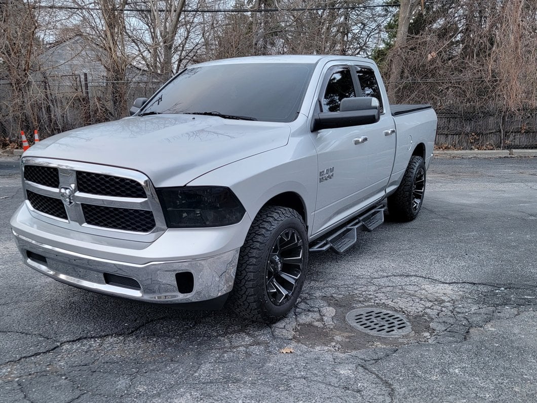 Raxiom Axial Series Euro Style Headlights with Single Bulb; Black Housing; Clear Lens (09-18 RAM 1500 w/ Factory Halogen Non-Projector Headlights)