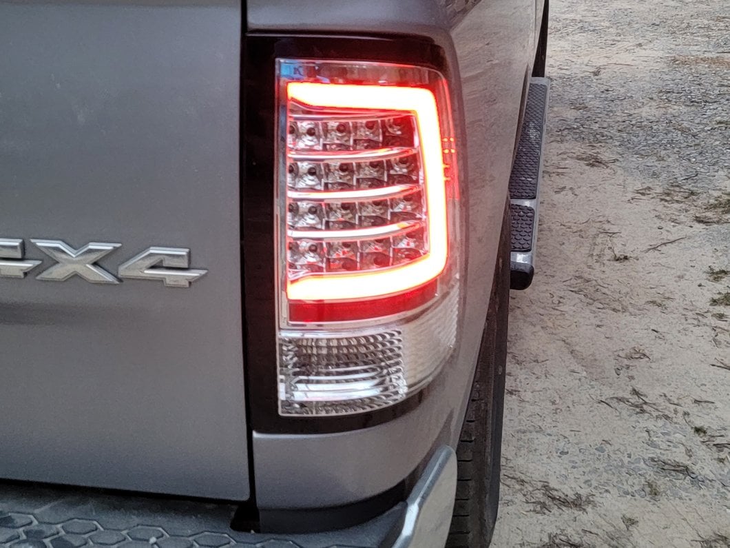 Raxiom Axial Series LED Tail Lights; Chrome Housing; Clear Lens (09-18 RAM 1500 w/ Factory Halogen Tail Lights)