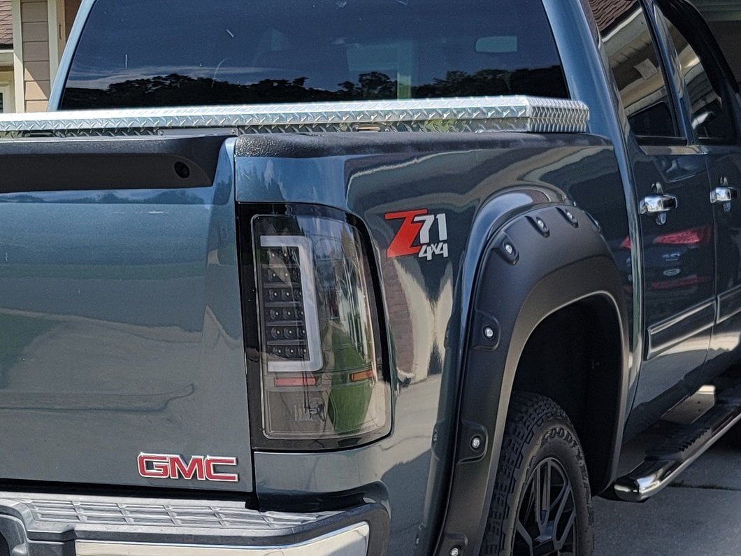 Raxiom Axial Series C-Tube LED Tail Lights; Black Housing; Clear Lens (07-13 Sierra 1500)