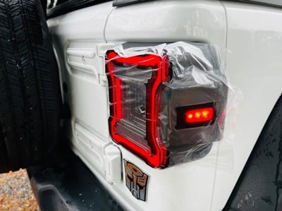 Raxiom Axial Series Plateau LED Tail Lights; Black Housing; Smoked Lens (18-25 Jeep Wrangler JL w/o Blind Spot Detection)