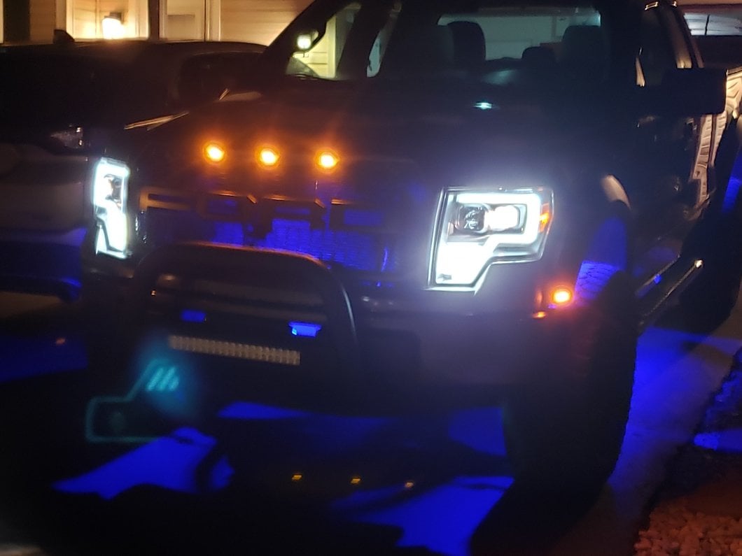 Raxiom Axial Series G4 Light Bar Switchback Projector Headlights; Black Housing; Clear Lens (09-14 F-150 w/ Factory Halogen Headlights)