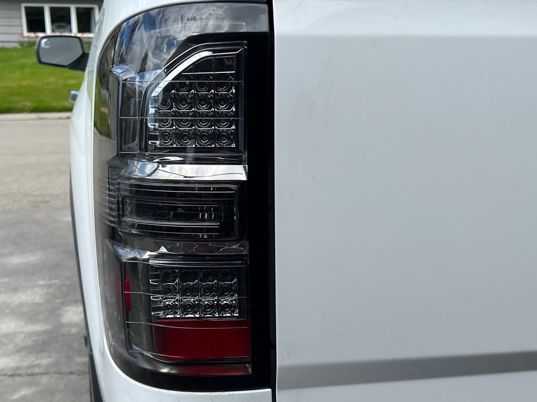 Raxiom Axial Series LED Tail Lights; Black Housing; Smoked Lens (14-18 Sierra 1500 w/ Factory Halogen Tail Lights)