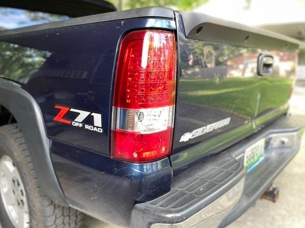 Raxiom LED Tail Lights; Chrome Housing; Red/Clear Lens (03-06 Silverado 1500 Fleetside)
