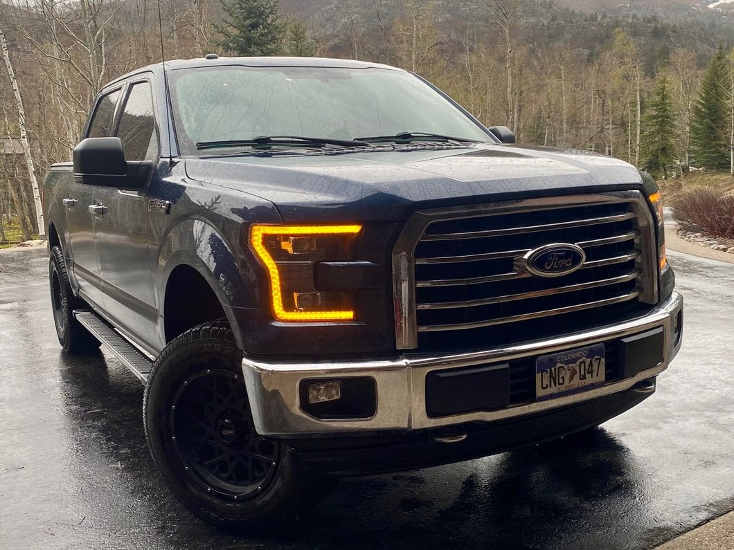 Raxiom LED Projector Headlights with LED Amber DRL; Black Housing; Clear Lens (15-17 F-150 w/ Factory Halogen Headlights)