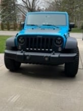 Raxiom 7-Inch LED Headlights; Black Housing; Clear Lens (07-18 Jeep Wrangler JK)