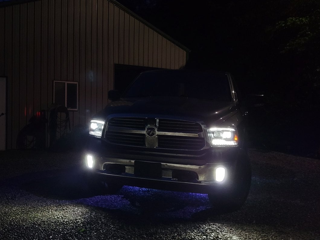 Raxiom LED Projector Headlights with Switchback Turn Signals; Black Housing; Clear Lens (09-18 RAM 1500 w/ Factory Halogen Non-Projector Headlights)