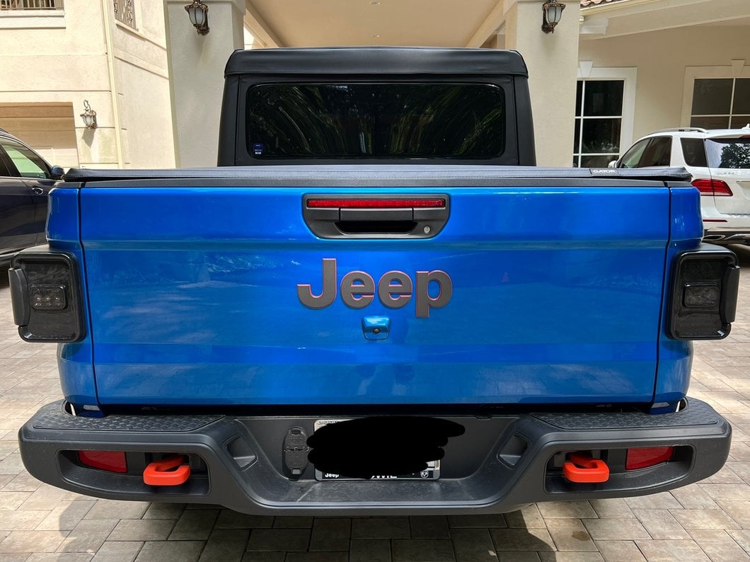 Raxiom LED Tail Lights; Black Housing; Smoked Lens (20-25 Jeep Gladiator JT w/ Factory Halogen Tail Lights & w/o Blind Spot Detection))