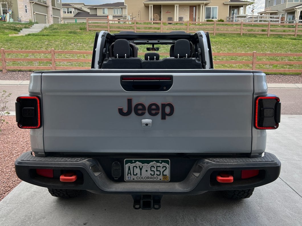 Raxiom LED Tail Lights; Black Housing; Smoked Lens (20-25 Jeep Gladiator JT w/ Factory Halogen Tail Lights & w/o Blind Spot Detection))