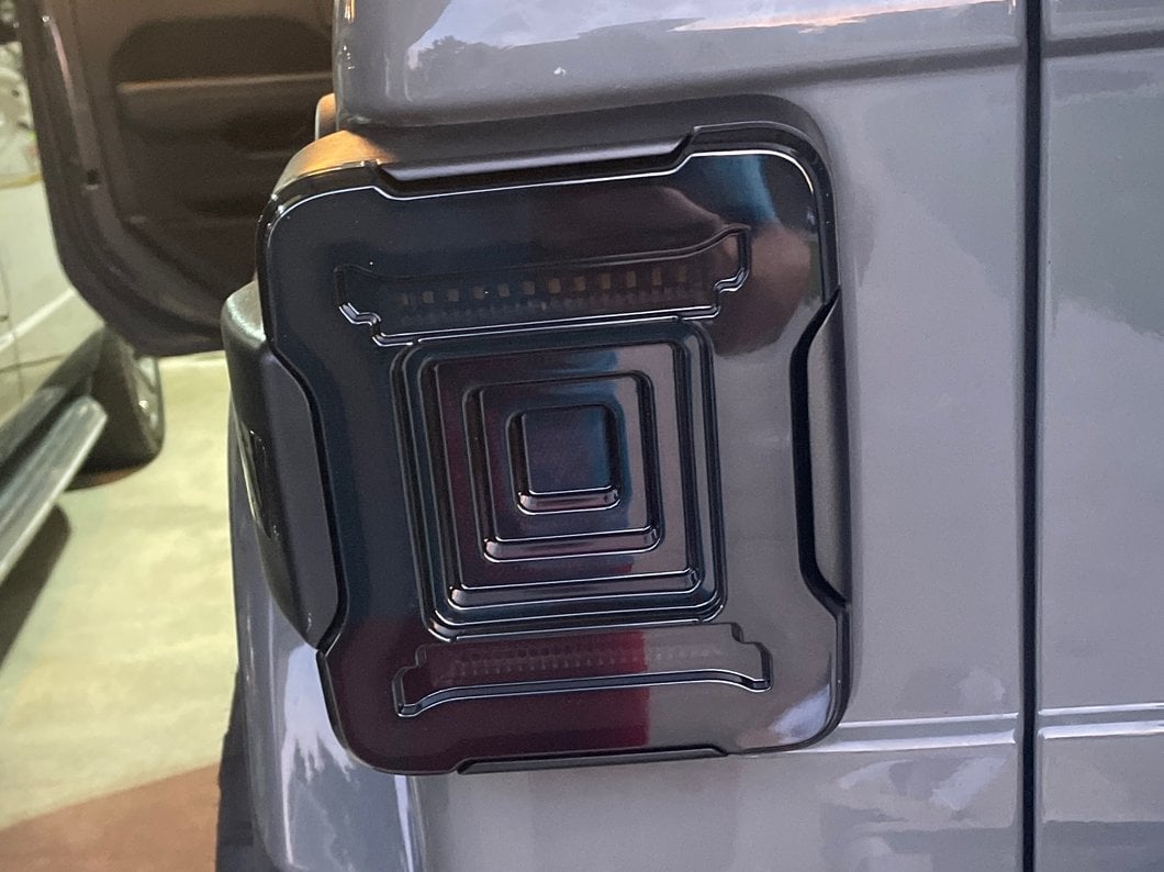 Raxiom Axial Series Plateau LED Tail Lights; Black Housing; Smoked Lens (18-25 Jeep Wrangler JL w/o Blind Spot Detection)