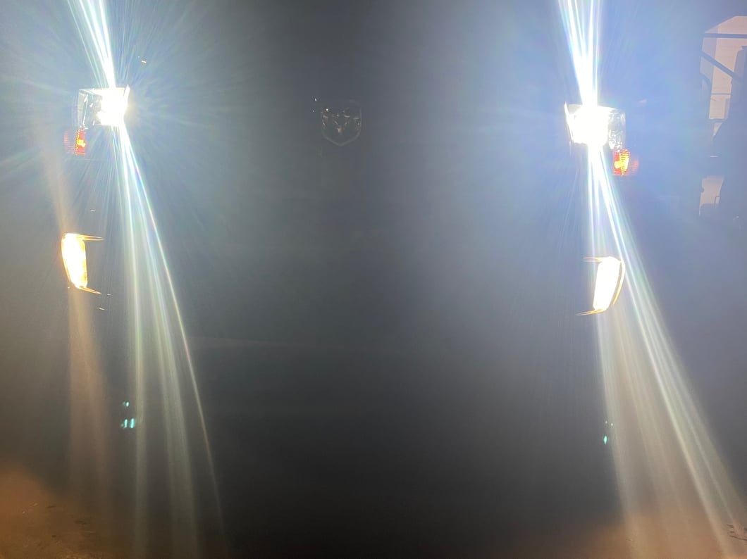 Raxiom Axial Series Euro Style Headlights with Dual Bulb; Black Housing; Clear Lens (09-18 RAM 1500 w/ Factory Halogen Non-Projector Headlights)