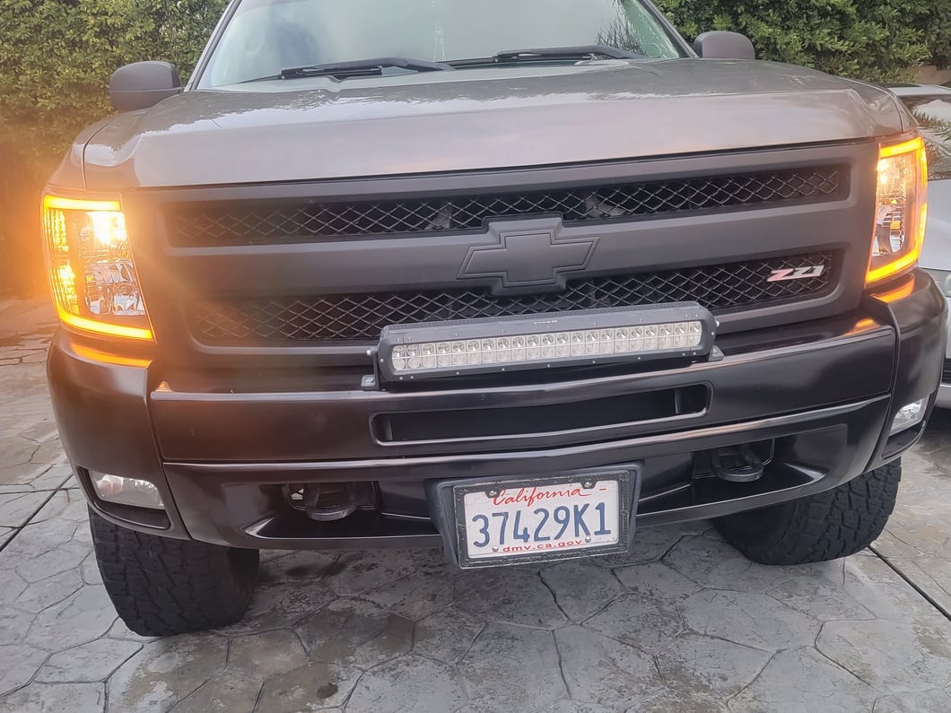 Raxiom Axial Series Headlights with Sequential LED Bar; Black Housing; Clear Lens (07-13 Silverado 1500)