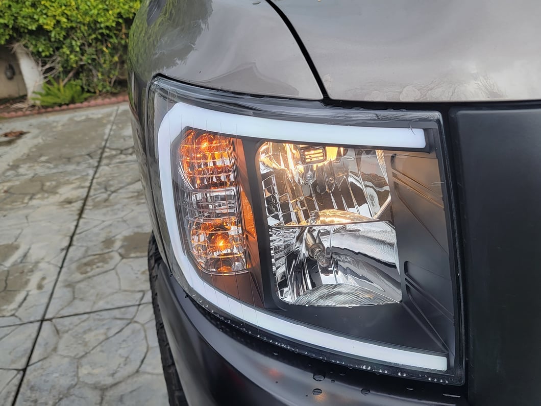 Raxiom Axial Series Headlights with Sequential LED Bar; Black Housing; Clear Lens (07-13 Silverado 1500)