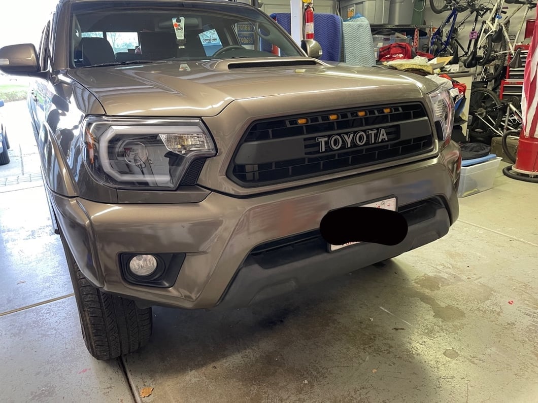Raxiom Axial Series Projector Headlights with Sequential LED Bar; Black Housing; Clear Lens (12-15 Tacoma)