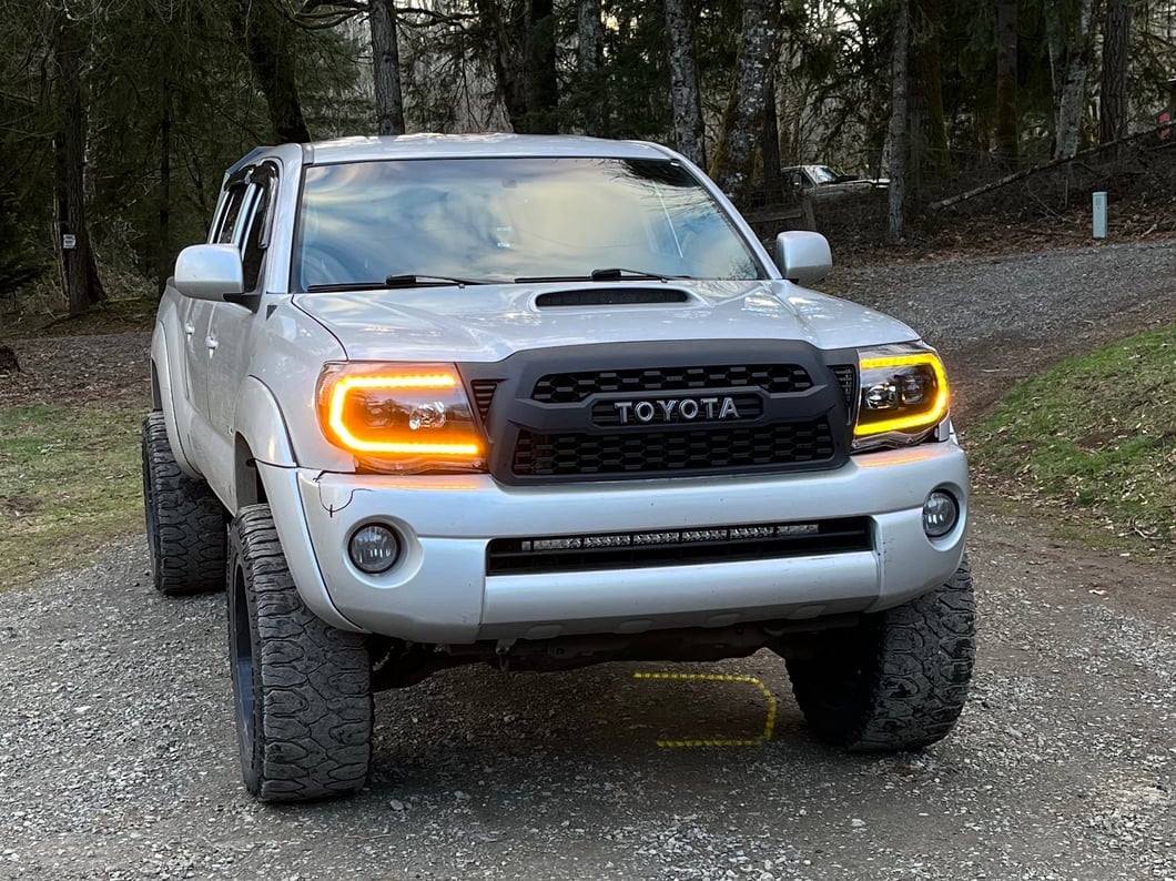 Raxiom Axial Series Switchback Projector Headlights; Black Housing; Clear Lens (05-11 Tacoma)