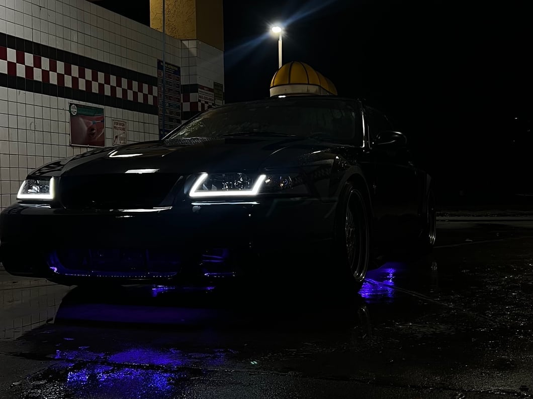 Raxiom Axial Series Headlights with LED Bar; Black Housing; Clear Lens (99-04 Mustang)