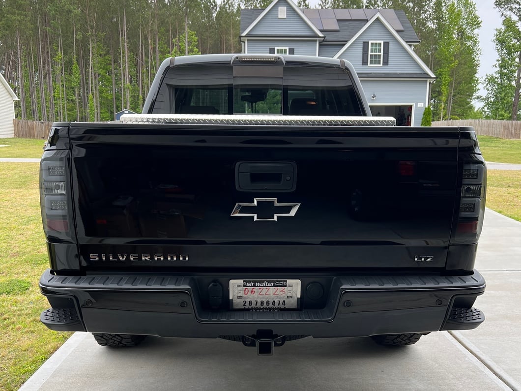 Raxiom Axial Series LED Tail Lights; Black Housing; Smoked Lens (16-18 Silverado 1500 w/ Factory Halogen Tail Lights)