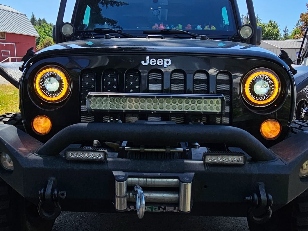 Raxiom Axial Series 7-Inch Dragon Eye LED Headlights; Black Housing; Clear Lens (07-18 Jeep Wrangler JK)