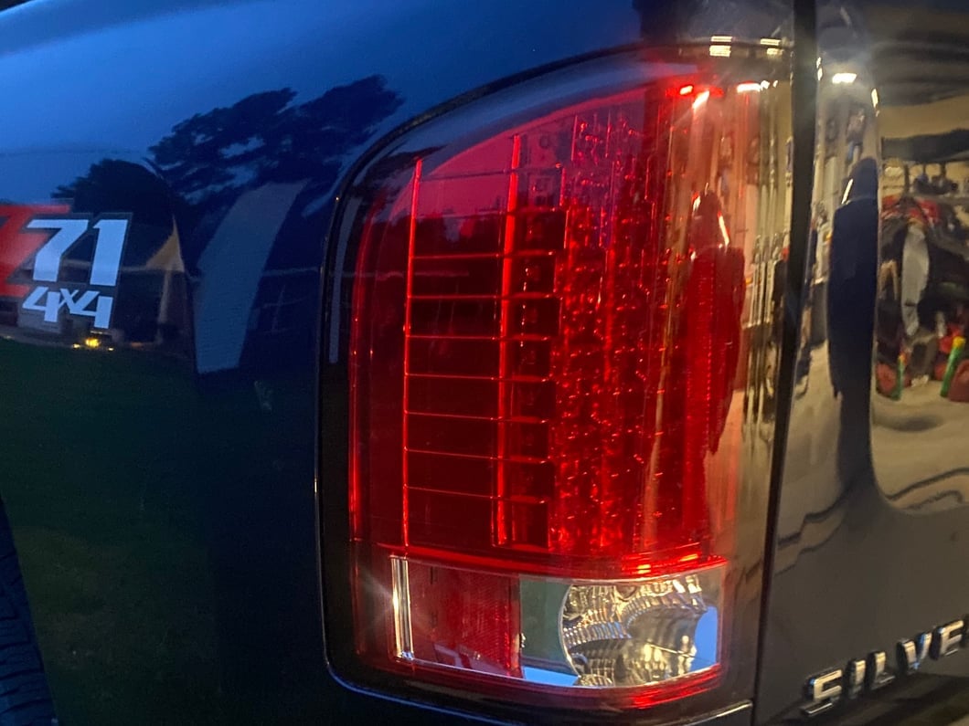 Raxiom LED Tail Lights; Chrome Housing; Red/Clear Lens (07-13 Silverado 1500)