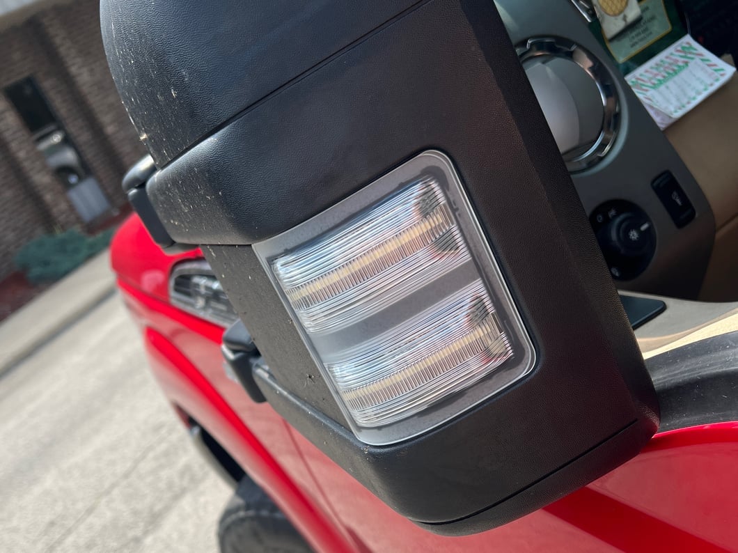 Raxiom Axial Series LED Sequential Switchback Side Mirror Marker Lamps; Clear (11-16 F-250 Super Duty)