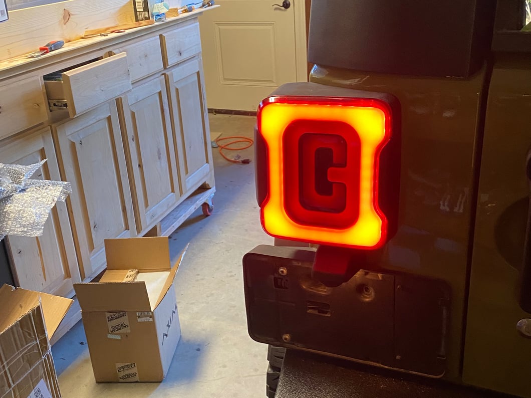 Raxiom Axial Series Carver LED Tail Lights; Black Housing; Smoked Lens (07-18 Jeep Wrangler JK)