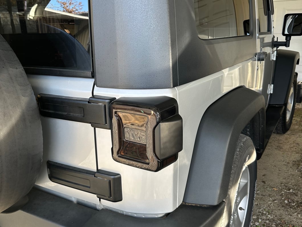 Raxiom LED Tail Lights; Red Housing; Smoked Lens (07-18 Jeep Wrangler JK)