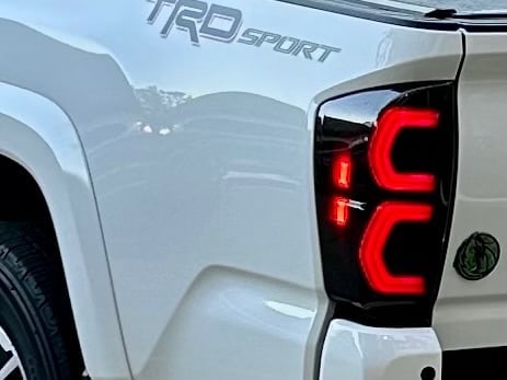 Raxiom Deuce LED Tail Lights; Black Housing; Smoked Lens (16-23 Tacoma)