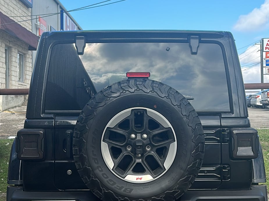 Raxiom LED Tail Lights; Red Housing; Smoked Lens (18-25 Jeep Wrangler JL w/ Factory Halogen Tail Lights & w/o Blind Spot Detection)