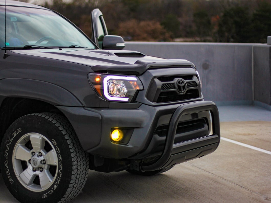 Raxiom Axial Series Projector Headlights with LED Bar; Black Housing; Clear Lens (12-15 Tacoma)