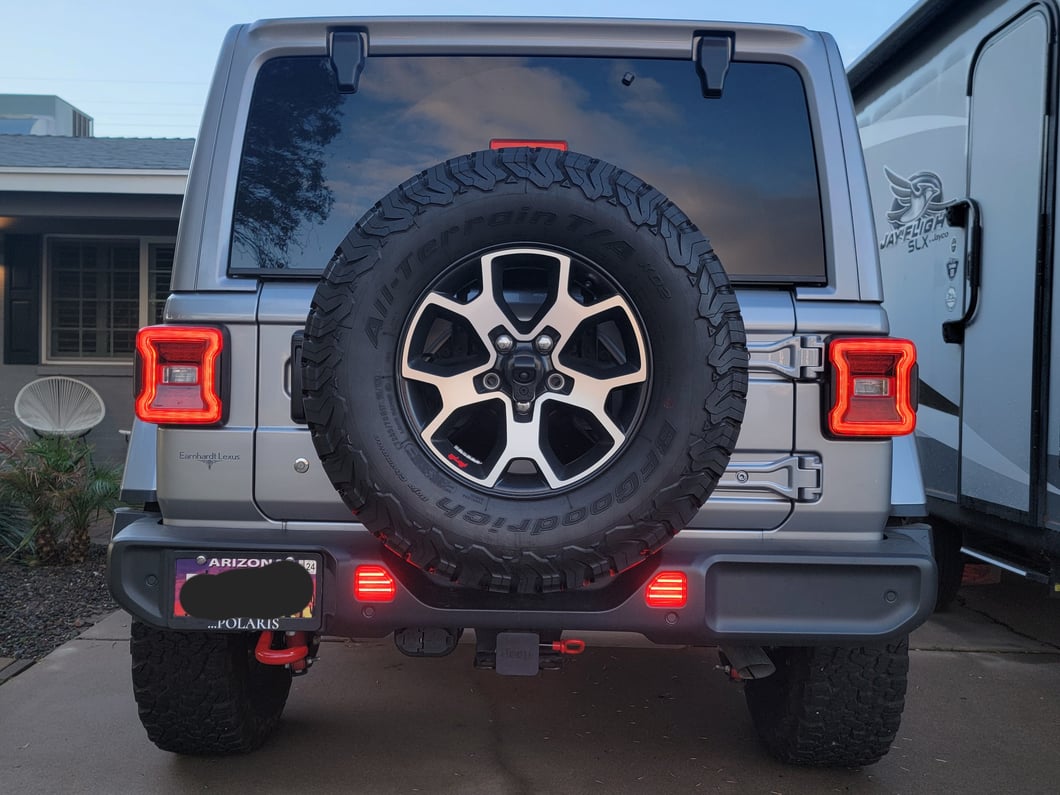 Raxiom Axial Series LED Rear Bumper Reflector Lights; Clear (18-25 Jeep Wrangler JL Moab, Rubicon, Sahara)