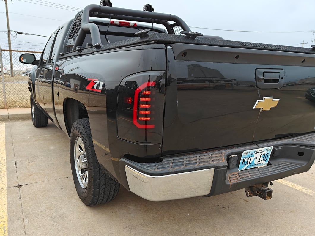 Raxiom Axial Series LED Tail Lights; Black Housing; Smoked Lens (07-13 Silverado 1500)