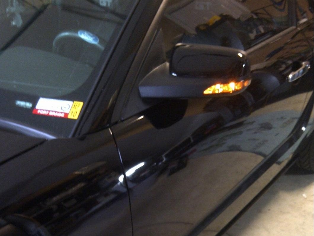Raxiom Directional Sideview Mirrors with Turn Signals (05-09 Mustang)