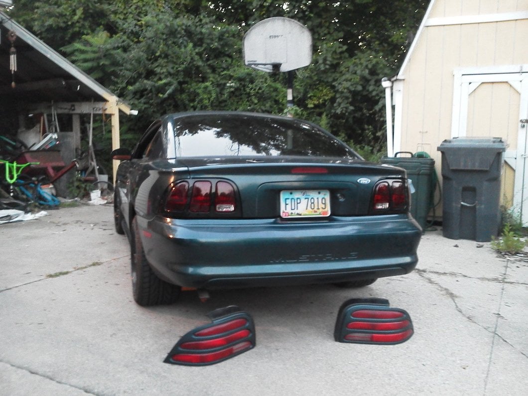 Raxiom Tail Lights; Black Housing; Smoked Lens (96-98 Mustang)