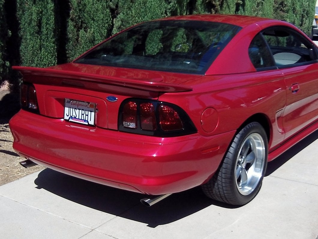 Raxiom Tail Lights; Black Housing; Smoked Lens (96-98 Mustang)